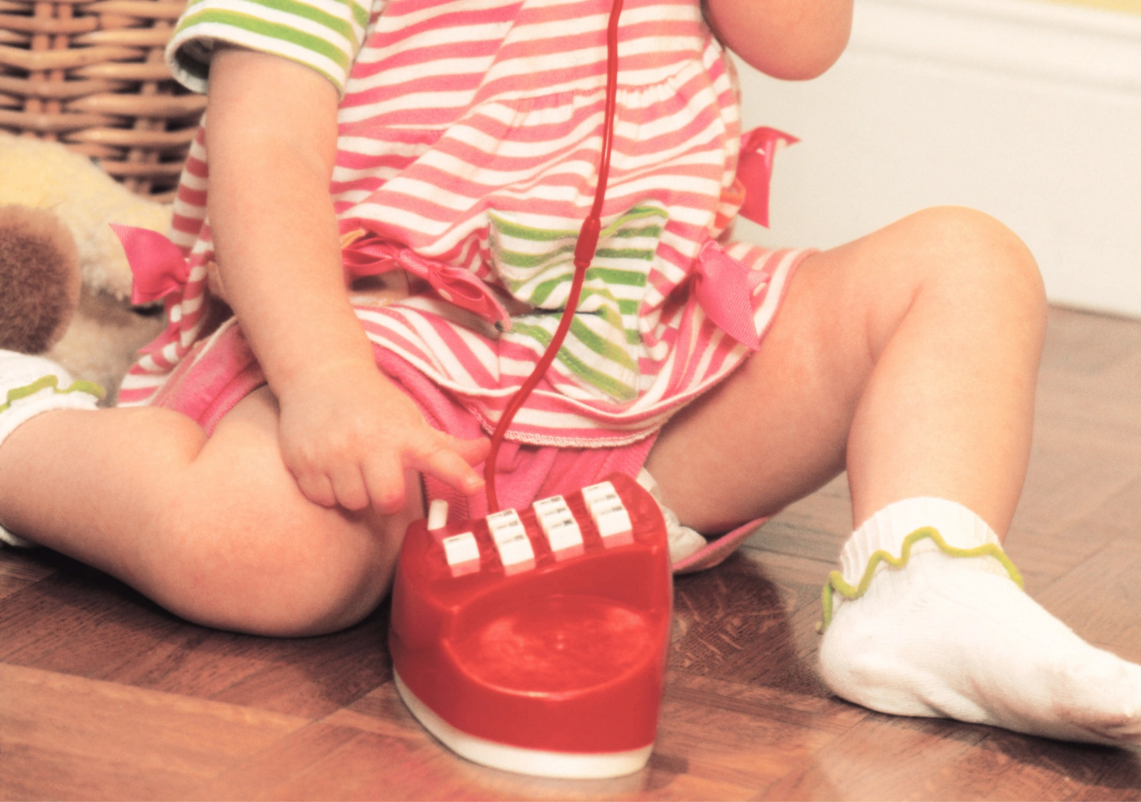 A child with a toy phone