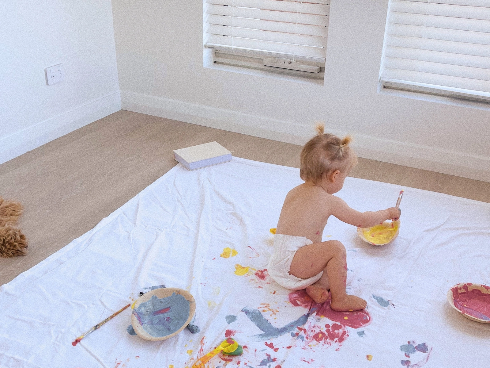Child playing with paint