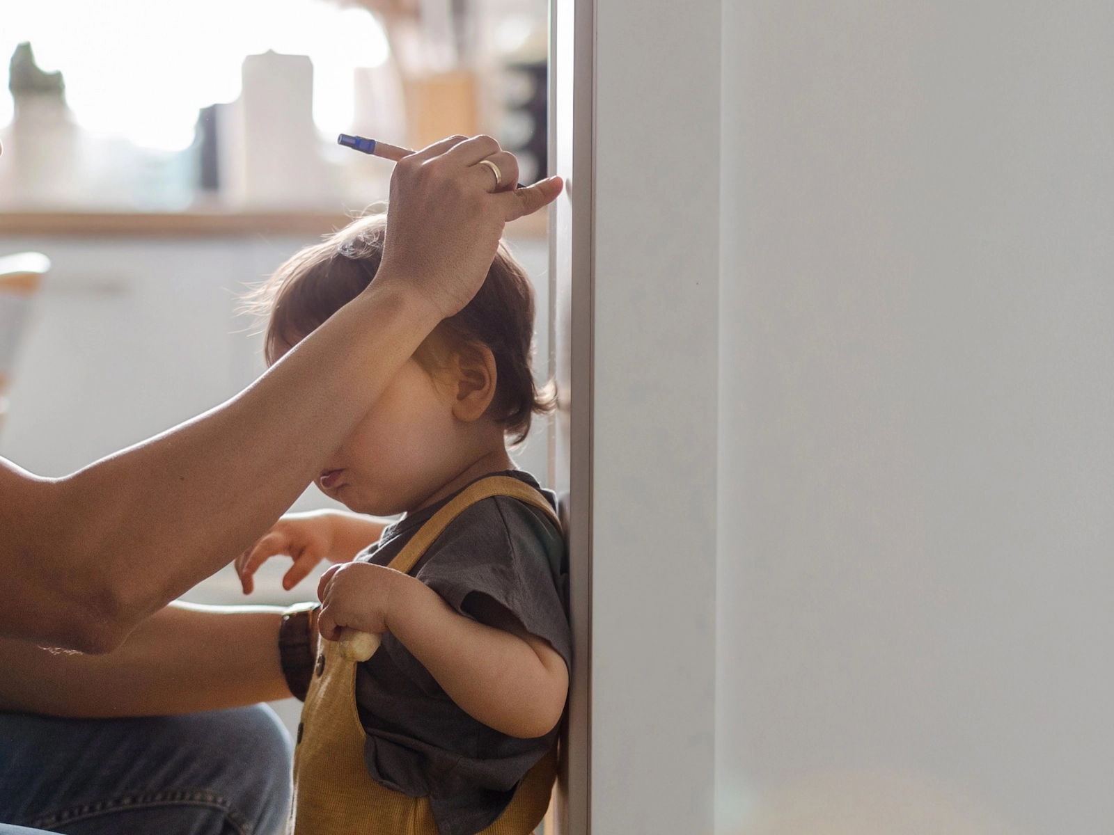 Drawing a childs height on wall