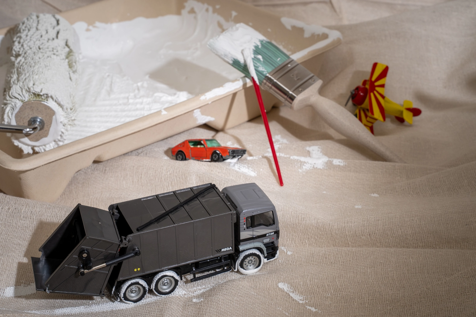 Toys being played with in paint