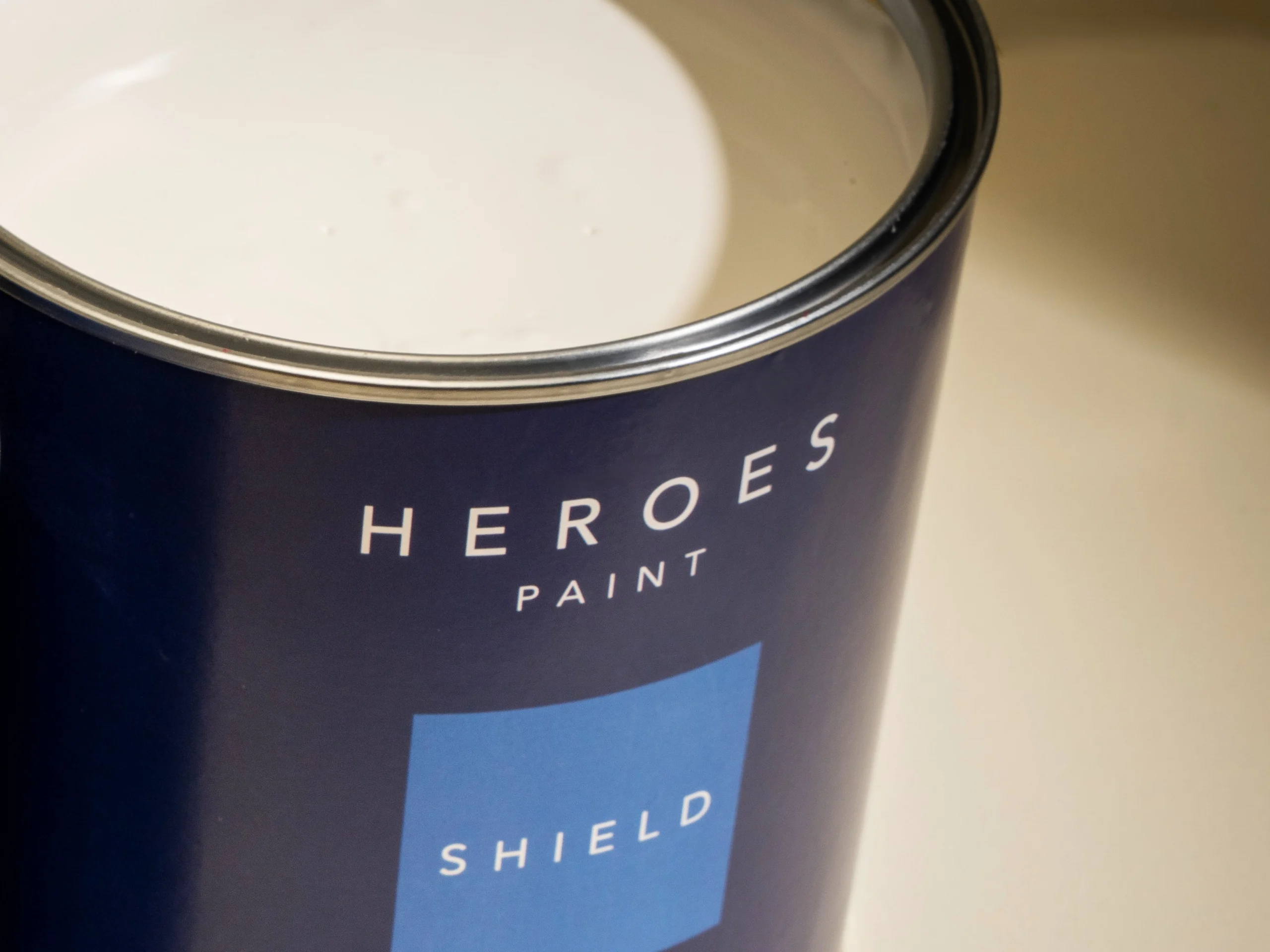 White anti-mould paint in a tin